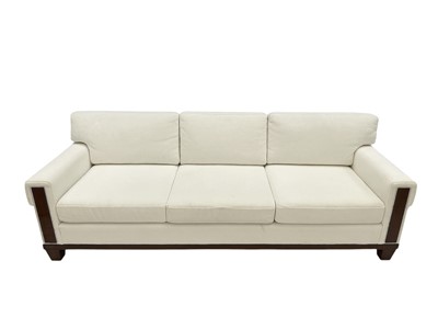 Lot 420 - Superyacht furnishings, a contemporary four/five seater sofa with white boucle fabric.