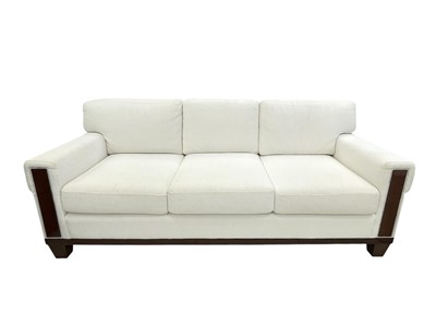 Lot 424 - Superyacht furnishings, a contemporary three/four seater sofa with white boucle fabric.