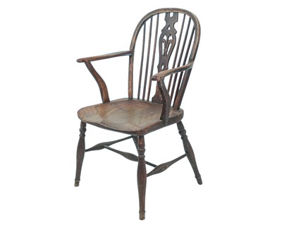 Lot 519 - An ash and elm Windsor armchair.