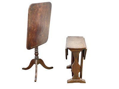 Lot 452 - A George IV mahogany tilt top table.