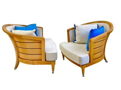 Lot 427 - Superyacht furnishings, a pair of upholstered chairs with curved backs.