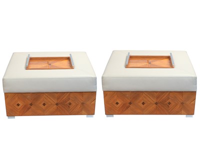 Lot 428 - Superyacht furnishings. Two beige leather upholstered ottomans with trays.