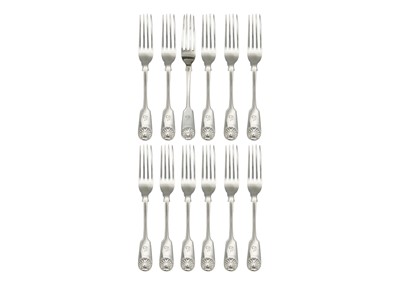 Lot 275 - A Victorian silver set of twelve fiddle and shell pattern tablespoons.