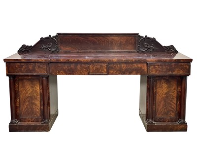 Lot 488 - A William IV figured mahogany twin pedestal sideboard.
