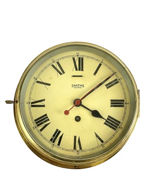 Lot 390 - A Smiths Astral brass bulkhead wall clock.