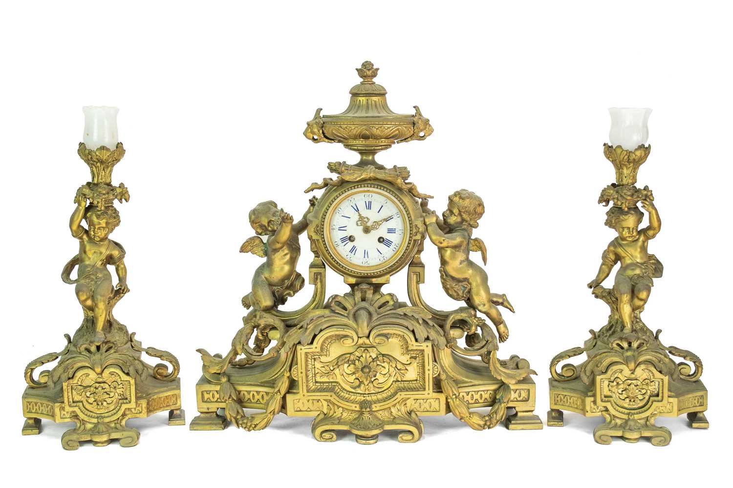 Lot 376 - A French ormolu clock garniture.