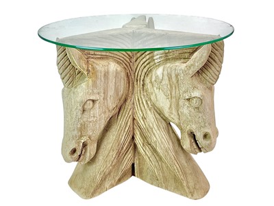 Lot 376 - A glass topped occasional table.
