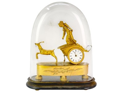 Lot 371 - A Regency gilt metal timepiece.