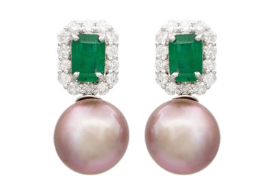 Lot 144 - A pair of 18K white gold emerald and pearl stud earrings.