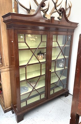 Lot 3143 - A George III mahogany bookcase cabinet,...