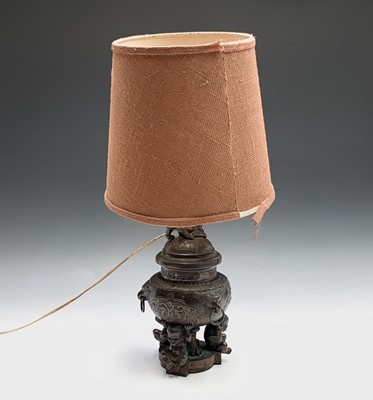 Lot 256 - A Chinese bronze lidded urn, adapted to a...