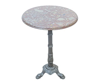 Lot 439 - A wrought iron and reconstituted marble circular conservatory table