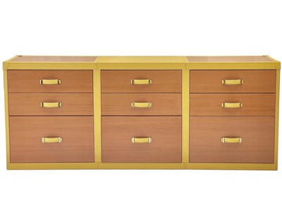 Lot 422 - Superyacht furnishings, a yellow leather bank of nine-drawers.