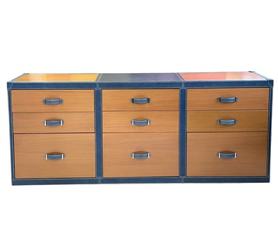Lot 415 - Superyacht furnishings, a blue leather bank of nine-drawers