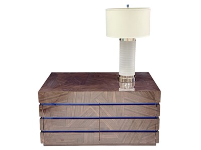 Lot 421 - Superyacht furnishings, a contemporary low cupboard unit with an integral lamp.