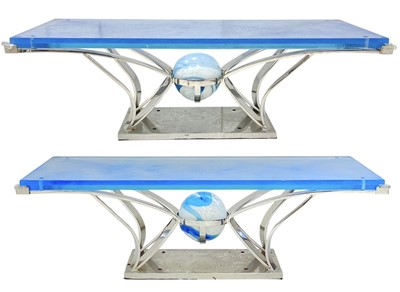 Lot 407 - Superyacht furnishings, a pair of contemporary chrome and blue glass coffee tables.