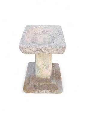 Lot 332 - A reconstituted stone bird bath.