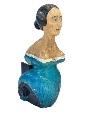 Lot 216 - A carved and painted wood ship's figurehead style figure.