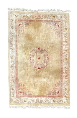 Lot 610 - A Chinese carpet.