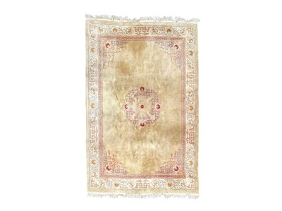 Lot 497 - A Chinese carpet.