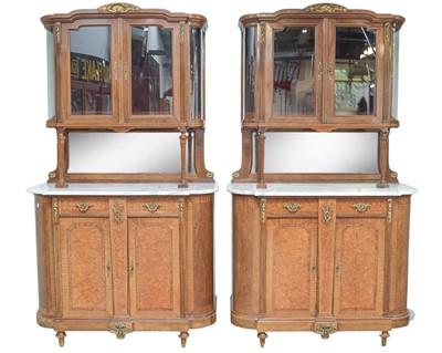 Lot 455 - A pair of French Second Empire style marble top cabinets.