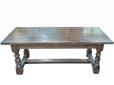 Lot 446 - An oak refectory dining table