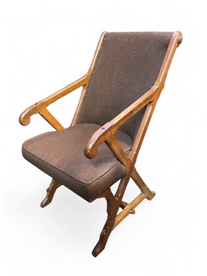 Lot 486 - An Arts and Crafts walnut armchair.
