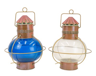 Lot 211 - Two copper and brass mounted globe ship's type lanterns.
