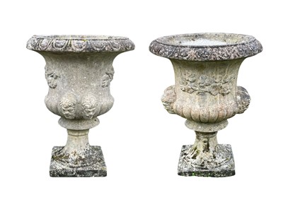 Lot 340 - A pair of reconstituted stone 'Medici' urns.