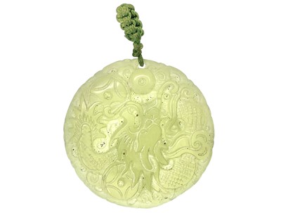 Lot 754 - A Chinese jade circular pendant.