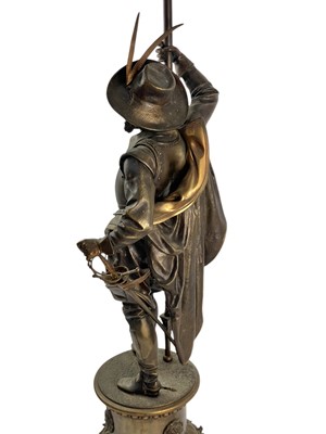 Lot 87 - A substantial bronze cavalier floor lamp.