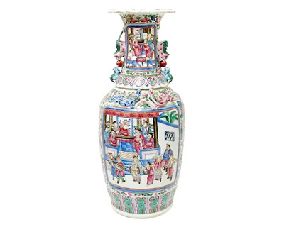 Lot 681 - A Canton Famille Rose polychrome decorated floor vase.