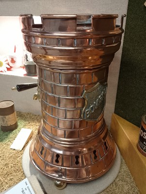 Lot 198 - A Bovril Castle castellated hot water urn.