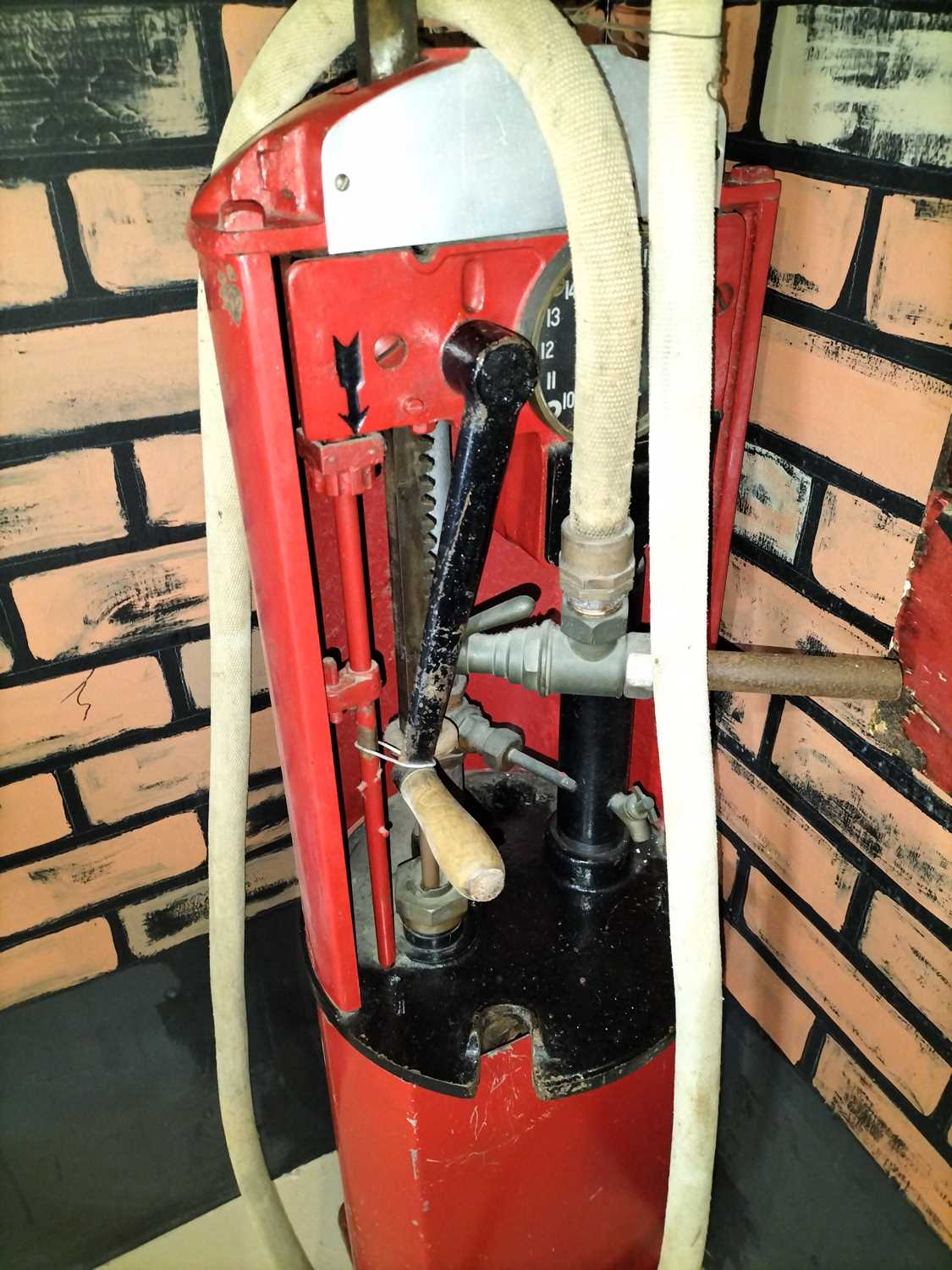 Lot 37 - A hand cranked petrol pump from Flambards Garage.