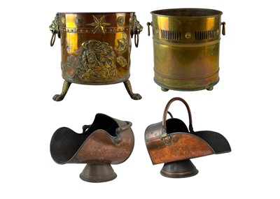 Lot 118 - A decorative Dutch brass mounted copper log bin.