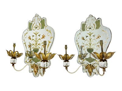 Lot 331 - An ornate pair of Venetian mirrored wall lights.