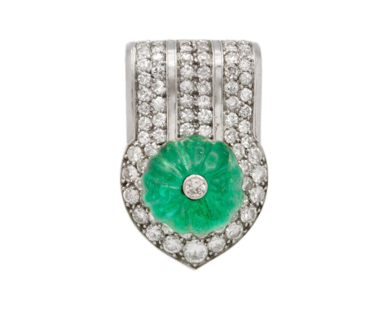 Lot 8 - CARTIER - A fine diamond and emerald Tutti Frutti clip brooch set in platinum.