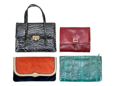 Lot 255 - A selection of four vintage handbags.