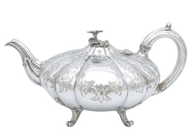 Lot 16 - A Victorian silver three-piece tea set by Charles Reily & George Storer.