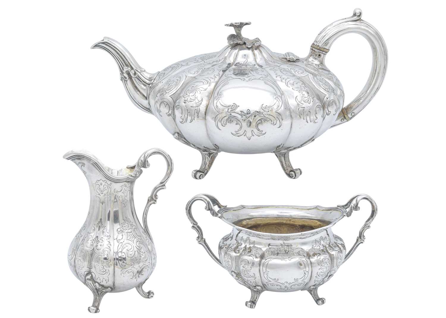 Lot 16 - A Victorian silver three-piece tea set by Charles Reily & George Storer.