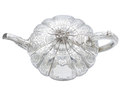 Lot 16 - A Victorian silver three-piece tea set by Charles Reily & George Storer.