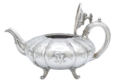 Lot 16 - A Victorian silver three-piece tea set by Charles Reily & George Storer.