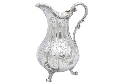 Lot 16 - A Victorian silver three-piece tea set by Charles Reily & George Storer.