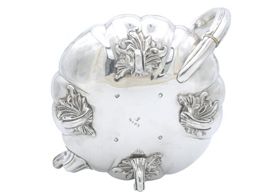 Lot 16 - A Victorian silver three-piece tea set by Charles Reily & George Storer.