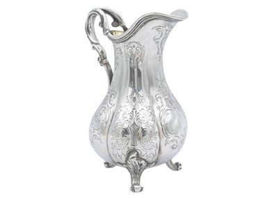 Lot 16 - A Victorian silver three-piece tea set by Charles Reily & George Storer.