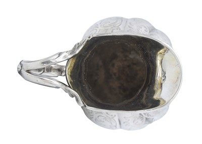 Lot 16 - A Victorian silver three-piece tea set by Charles Reily & George Storer.