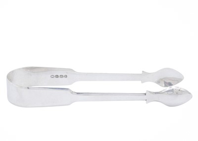 Lot 19 - An Edwardian silver cream jug, and a pair of George IV sugar tongs.