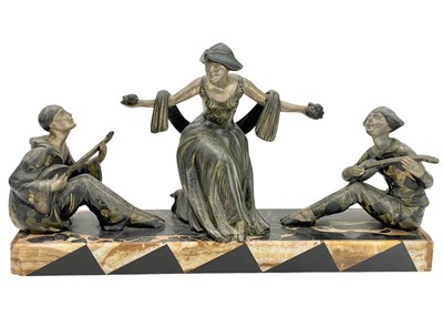 Lot 24 - A French Art Deco spelter Commedia dell'arte figure group.