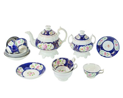 Lot 247 - A 19th century Gaudy Welsh tea set.