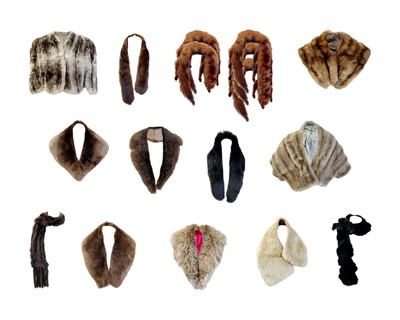 Lot 519 - A good selection of fur shrugs and stoles.